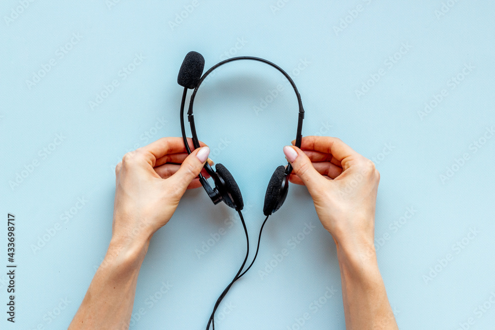 Helpline concept. Voip headset equipment for pc call center support Helpline concept. Voip headset equipment for pc call center support