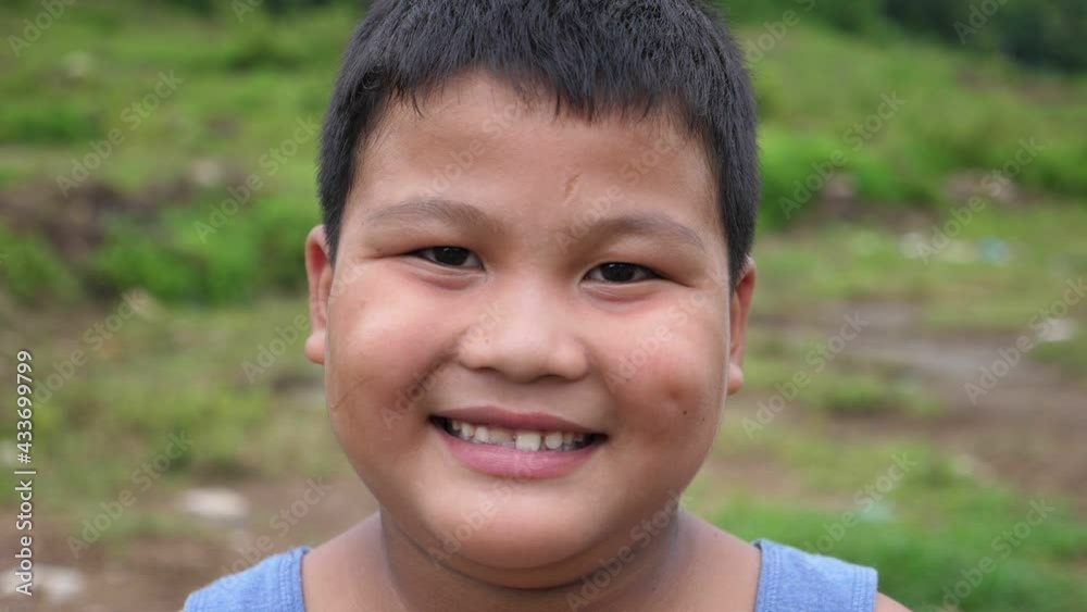 Asian Boy Smiling
Asian Boy Smiling