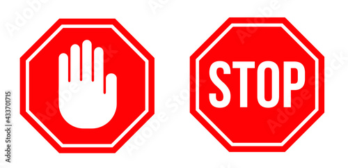 STOP signs in flat design. Vector illustration. Red stop signs isolated on white background
