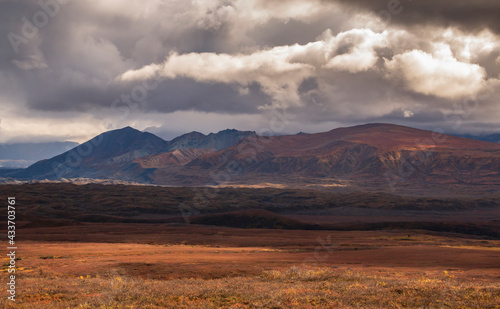 dramatic landscape of  mountain peaks and mountain ranges inside Denali National Park  during autumn season. © Nathaniel Gonzales