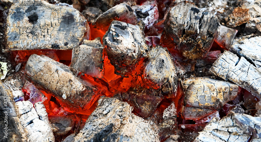 Smouldering coal for preparing grilled food. Background. Smouldering coal for preparing grilled food. Background.