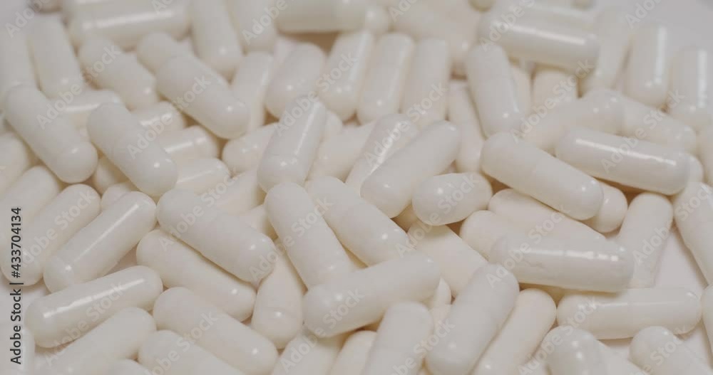 White pill in a group White pill in a group