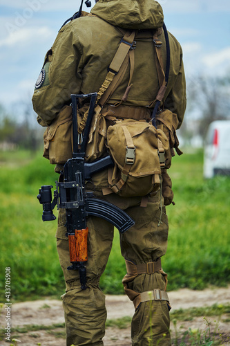 Back view of an airsoft player of a Russian soldier