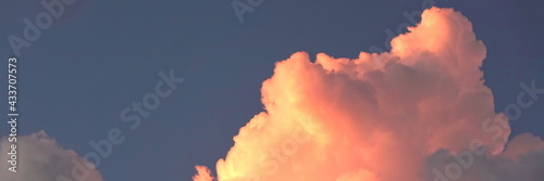 Dramatic Orange And Red  Sunset Wide Background. Colorful Clouds Panoramic Background.  Low Angel View Of Mystery Clouds Formations Wallpaper. 