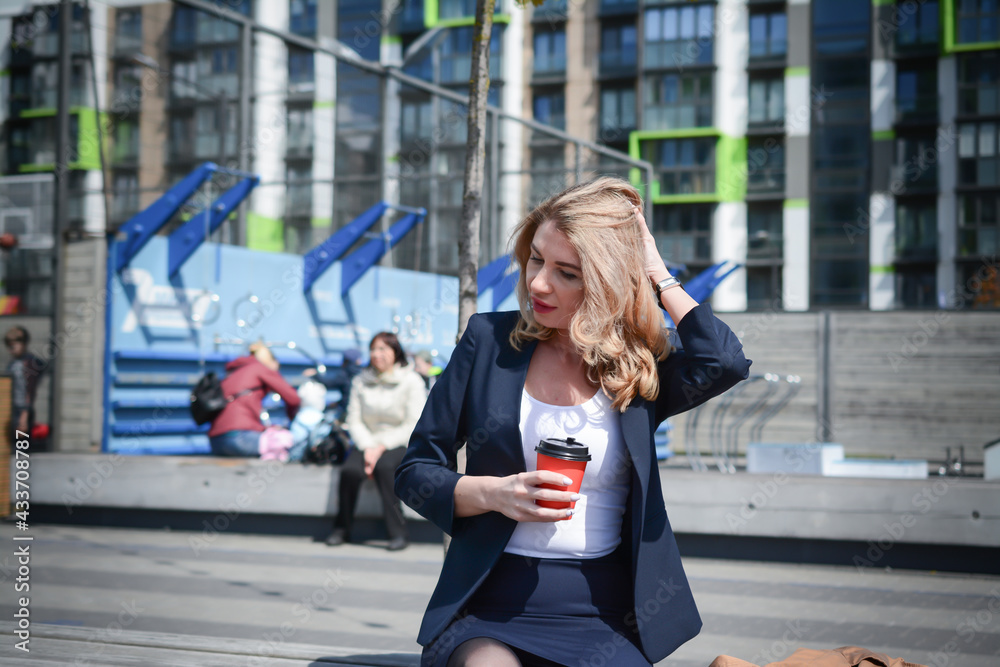 Fototapeta premium Business woman with a cup of coffee