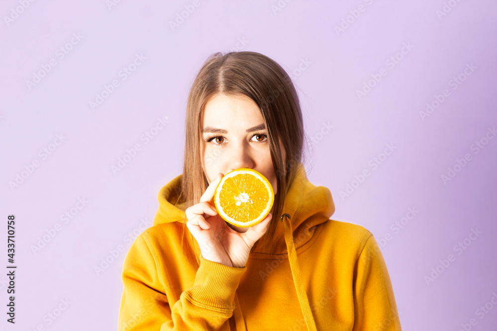 young woman with fresh orange citrus fruit young woman with fresh orange citrus fruit