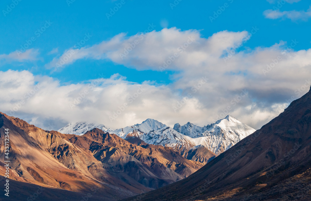 snow capped jagged mountain peaks of the Alaskan mountain range inside Denali national park. snow capped jagged mountain peaks of the Alaskan mountain range inside Denali national park.