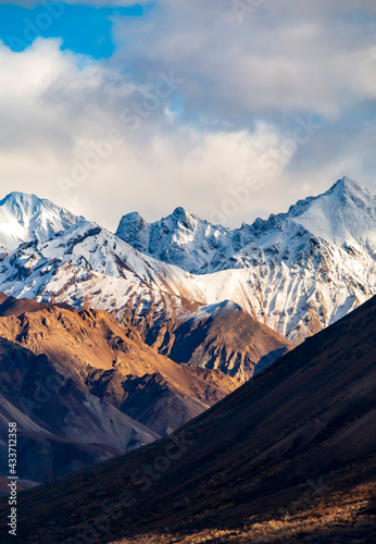 snow capped jagged mountain peaks of the Alaskan mountain range inside Denali national park. © Nathaniel Gonzales