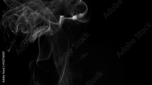 Movement of smoke on black background, smoke background, abstract smoke on black background