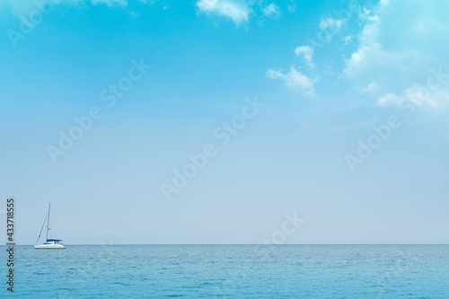 Light waves on the turquoise sea and speed ​​boat with anchor. for seascape background.