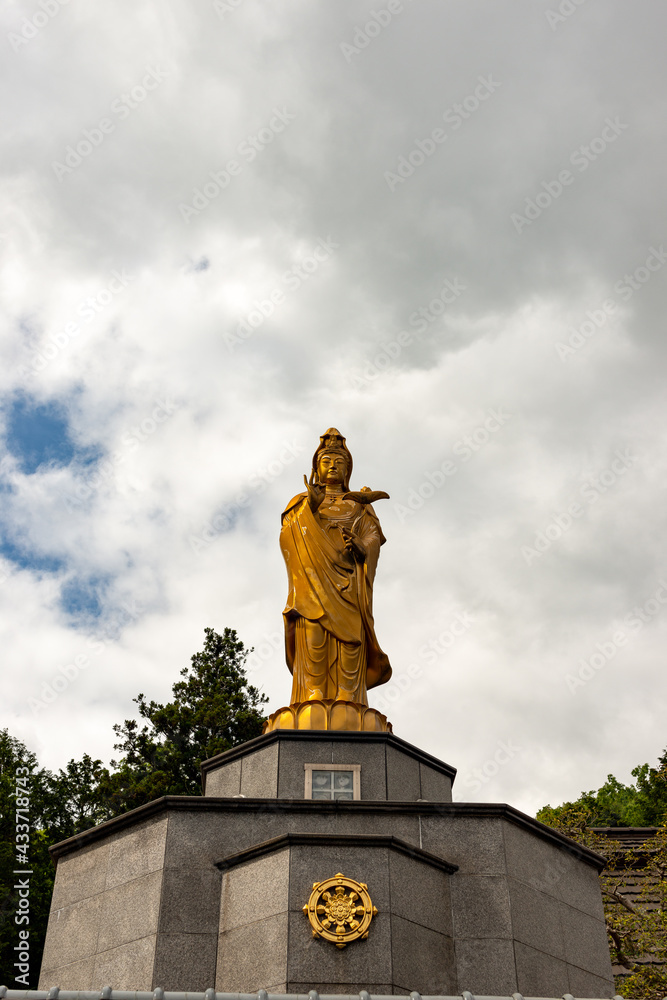 Golden statue of Kannon (Goddess of mercy) at Taifuku-ji temple in Kobe, Hyogo, Japan