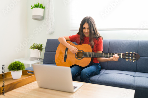Playing the guitar for my online instructor