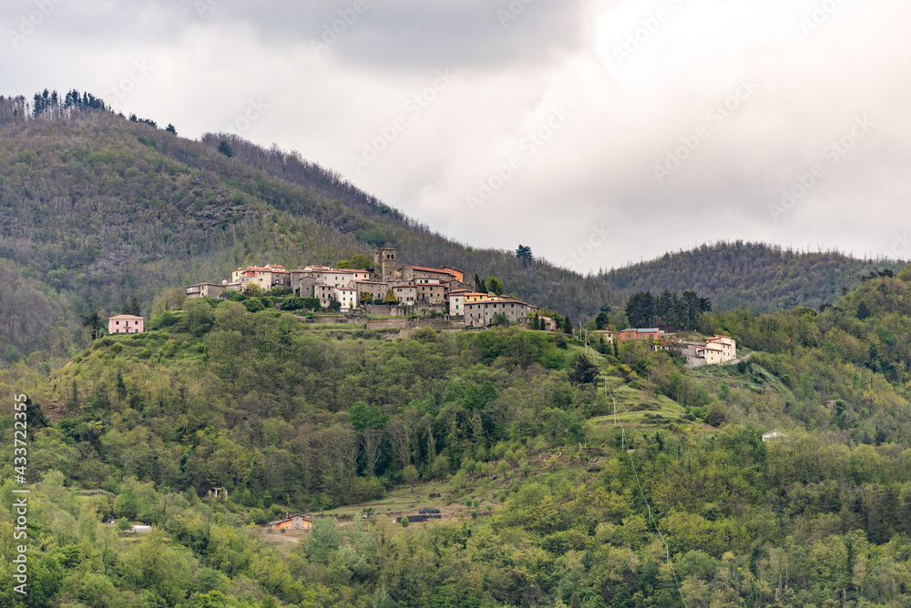 Small medieval town. On a high hill in the Tuscan mountains is an old Italian town. Spring in May in Italy