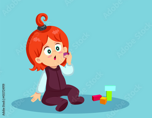 Toddler Child About to Swallow a Cube Toy