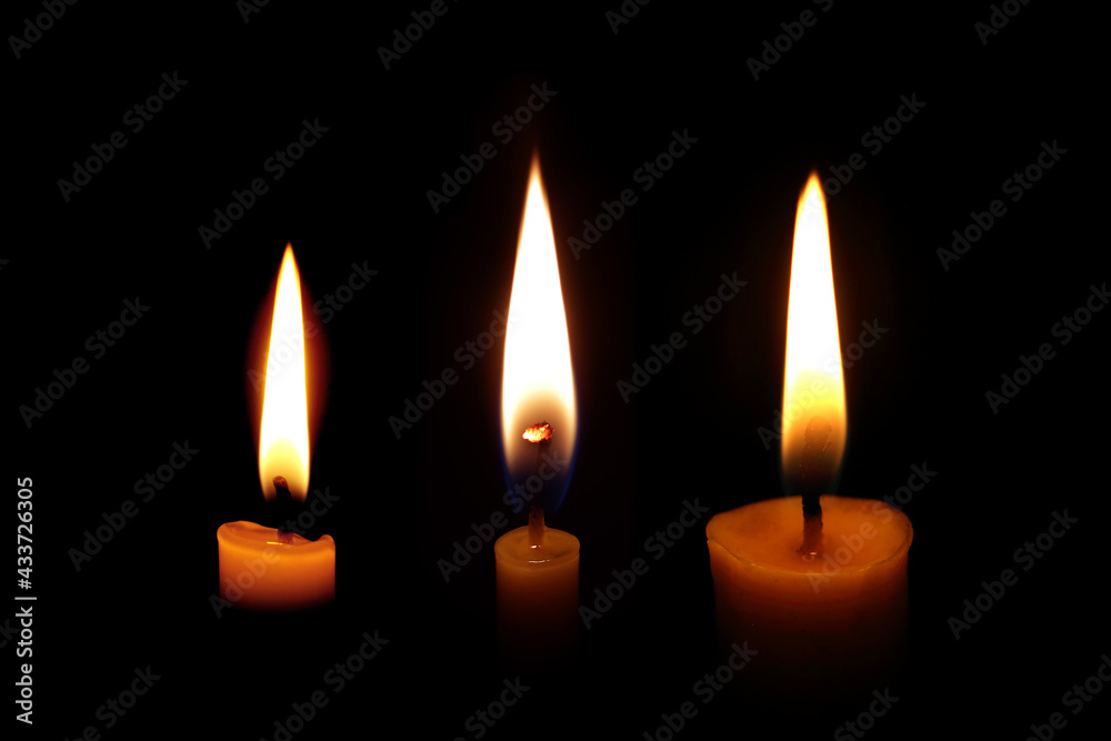 Candle flame at night closeup Or Candle light in the dark Stock Photo Adobe Stock
