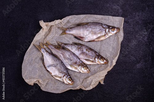 Dry fish on paper photo