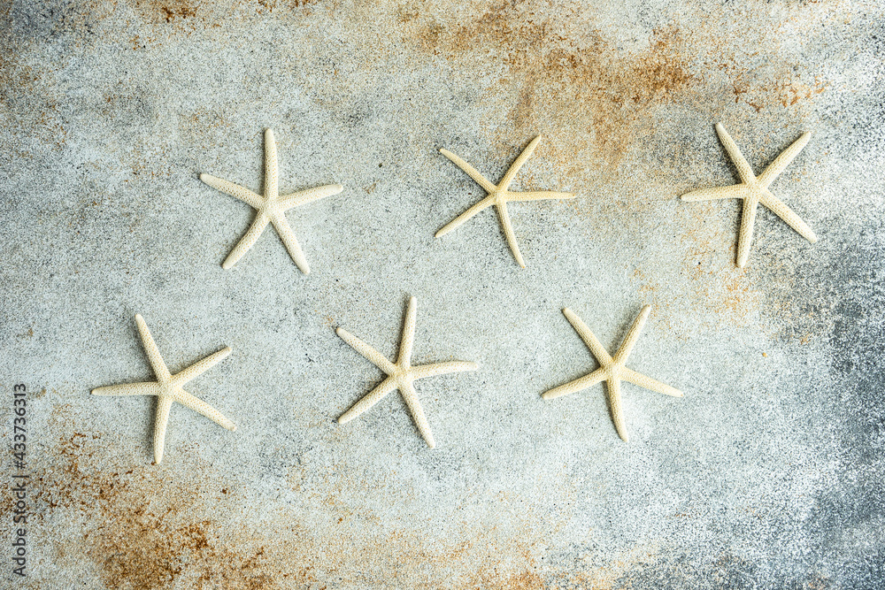Flat lay summer composition with sea stars Flat lay summer composition with sea stars