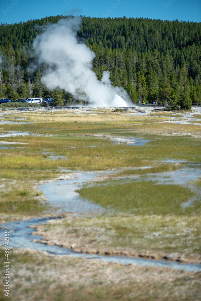 Eruption of Old Faithful geyser at Yellowstone Nationl park Eruption of Old Faithful geyser at Yellowstone Nationl park