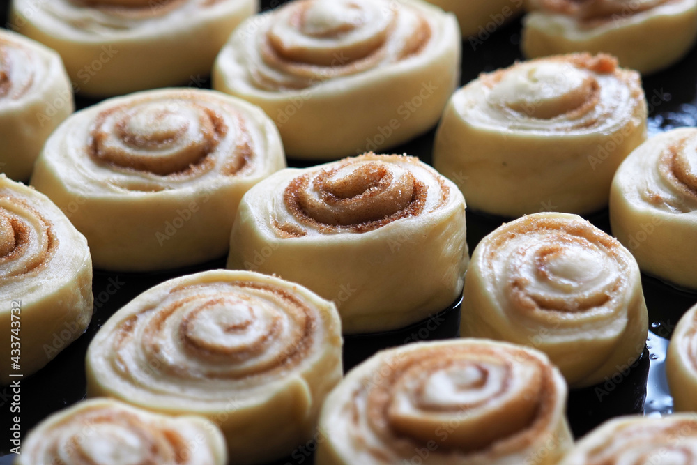 Sweet cinnamon rolls ready to bake in the oven