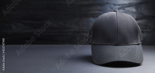 Baseball cap on the black background. photo