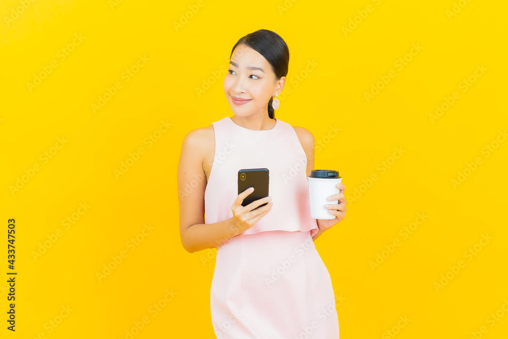Portrait beautiful young asian woman smile with smart mobile phone Portrait beautiful young asian woman smile with smart mobile phone