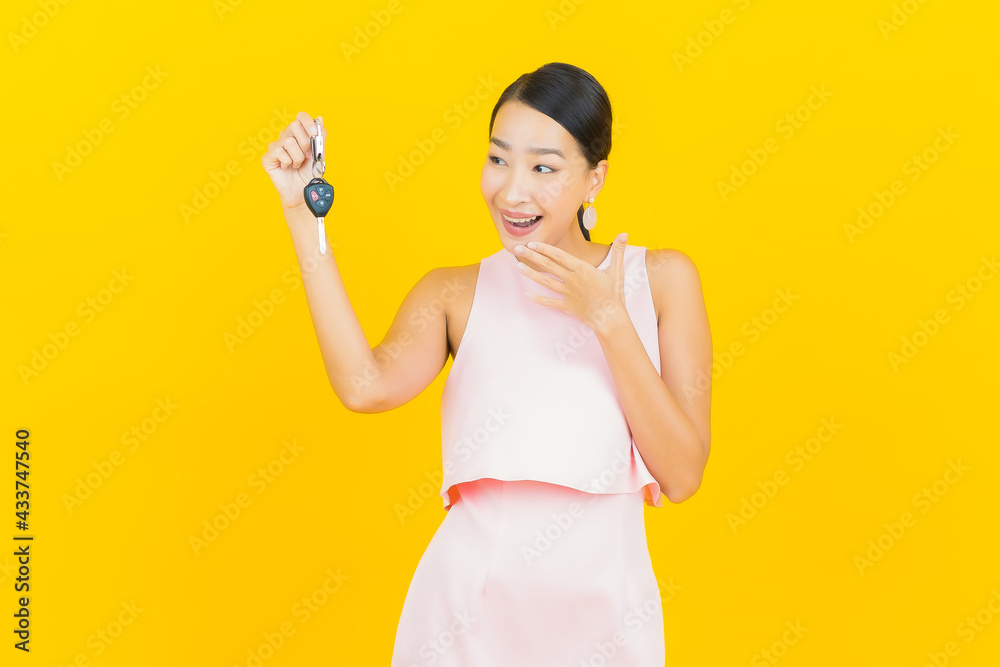 Portrait beautiful young asian woman smile with car key Portrait beautiful young asian woman smile with car key