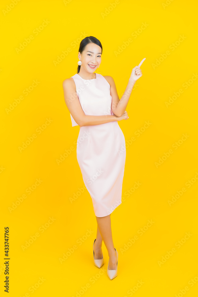 Portrait beautiful young asian woman smile with action Portrait beautiful young asian woman smile with action