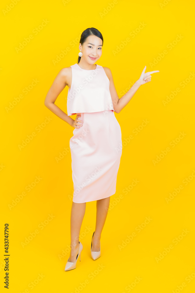 Portrait beautiful young asian woman smile with action Portrait beautiful young asian woman smile with action