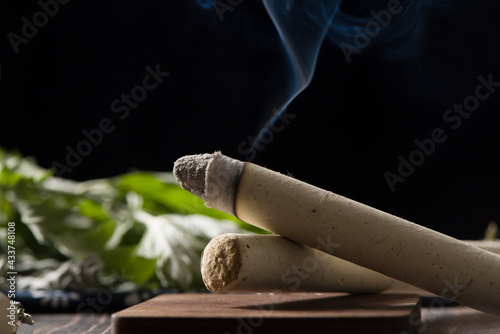 Chinese tradition moxa moxibustion sticks on a wooden table