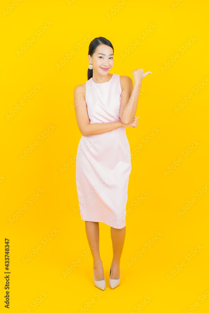 Portrait beautiful young asian woman smile with action Portrait beautiful young asian woman smile with action