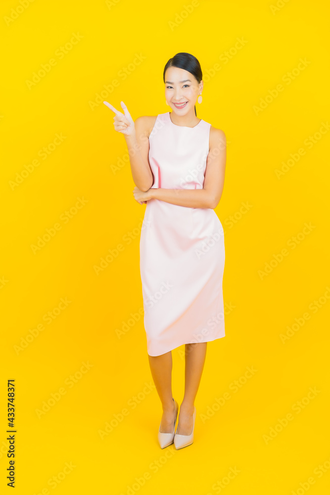 Portrait beautiful young asian woman smile with action Portrait beautiful young asian woman smile with action
