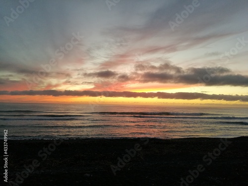 sunset and summer at Hapuku Beach, Rest area, New Zealand, South Island photo