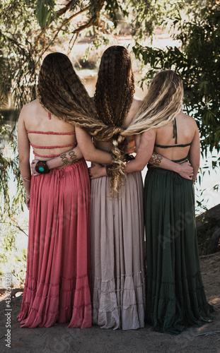 Sisters linking arms