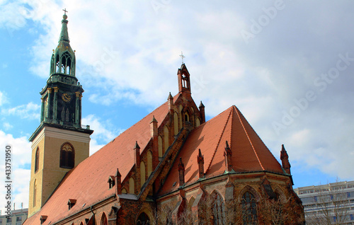 The old medieval Christian Protestant Church of St. Mary in the center of Berlin. The facade of the church building in the Gothic style.