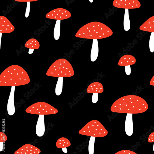 Seamless pattern with fly agaric on black background. Hand drawn vector mushrooms. Autumn texture fot print, textile, packaging.