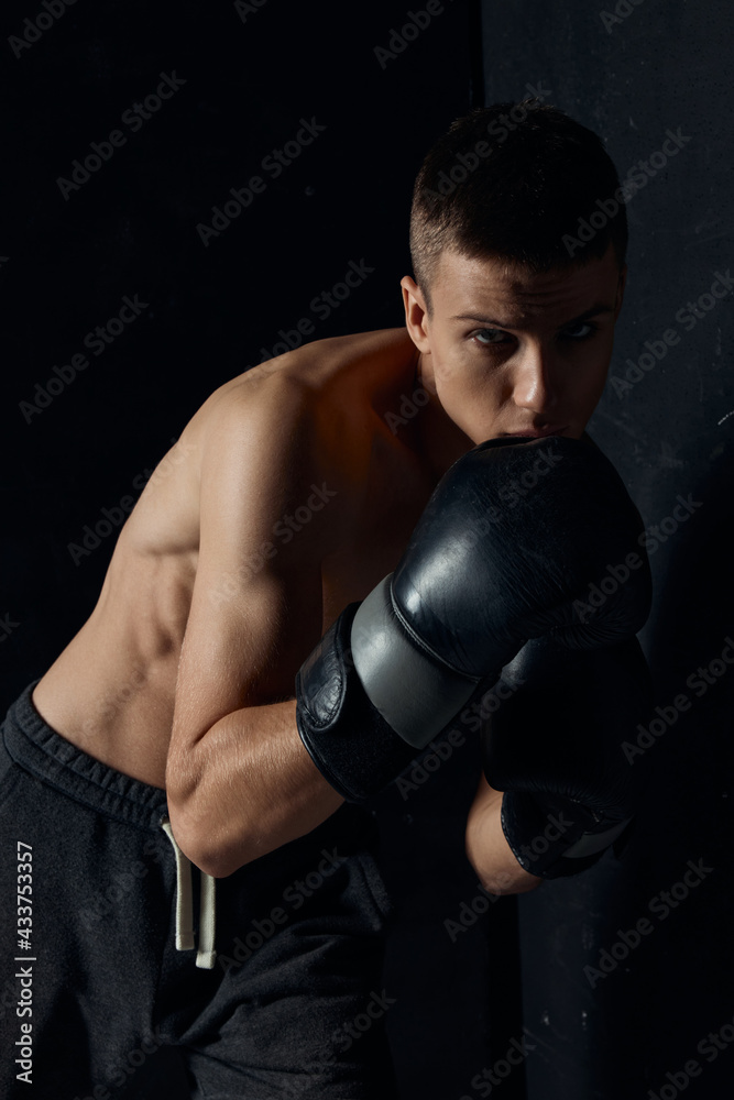 boxers two black gloves bent down sport bodybuilder pumped up torso