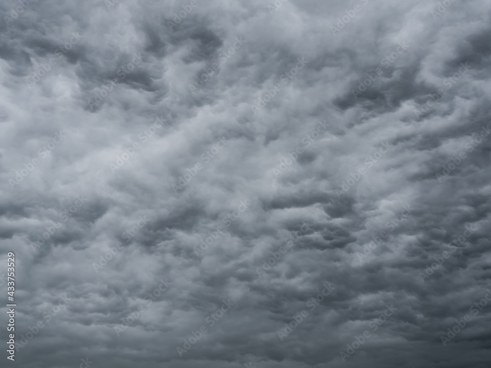 Bizarre ominous dark clouds in heaven, dramatic sky Bizarre ominous dark clouds in heaven, dramatic sky
