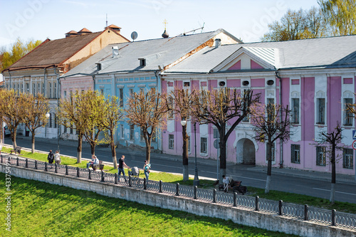 TVER, Russia, May 2021: View of the Stepan Razin Embankment on the Volga river in Tver. Old buildings on the embankment of Stepan Razin on the Volga River. photo