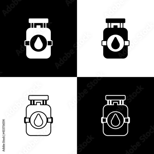 Set Propane gas tank icon isolated on black and white background. Flammable gas tank icon. Vector