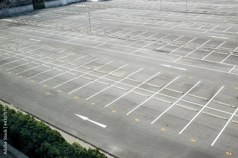 Fototapeta premium Empty parking lots near trade center or store.