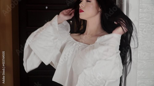 Cute Girl Posing Near the Mirror