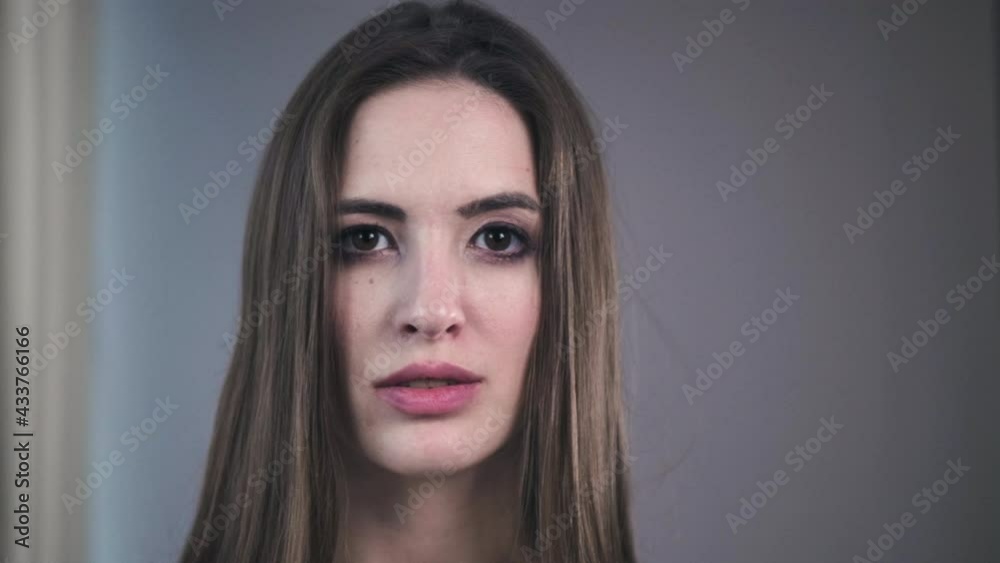 Confident Young Adult European Woman Looking At Camera Millennial Casual Professional Lady With Pretty Face Posing For Close Up Portrait Indoors Confident Young Adult European Woman Looking At Camera Millennial Casual Professional Lady With Pretty Face Posing For Close Up Portrait Indoors