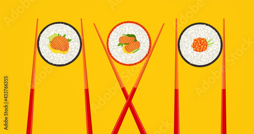 Sushi roll with salmon and wooden chopsticks on yellow background. Food concept, seafood with rice.