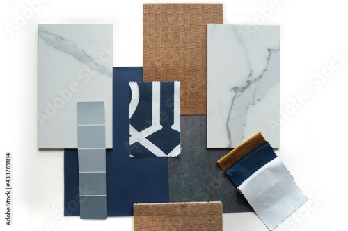 Moodboard. Material samples. Blue, white, warm wood, marble stone. photo