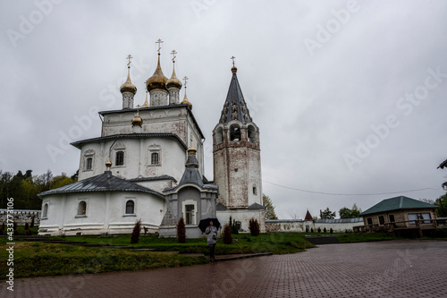 cityscape of the old center of Gorokhovets with churches, temples and houses in the rain