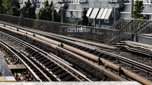 the iron elevated track of the hamburger ubahn line U3 in the port of hamburg in bright sunshine photo