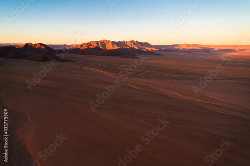 In the arid area of the world, the scenery of the Taklimakan Desert in Xinjiang, China, with a detailed background image of the desert Gobi.