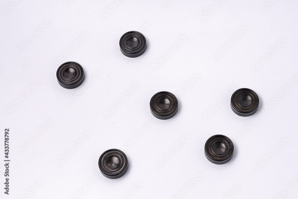 Top view of a group of checkers on a white background close-up Top view of a group of checkers on a white background close-up