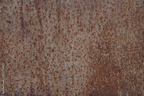 Metal rusted background. Metal rust texture. Erosion metal. Scratched and dirty texture on outdoor rusted metal wall.