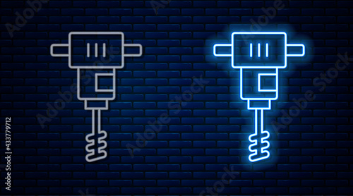 Glowing neon line Electrical hand concrete mixer icon isolated on brick wall background. Handheld electric cement mixer. Vector